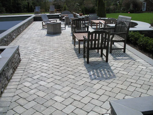 Poolscape with premium paver coping