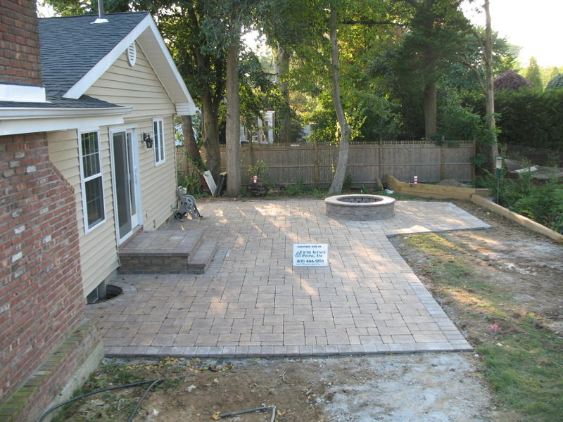 Outdoor living installation — pool deck and patio